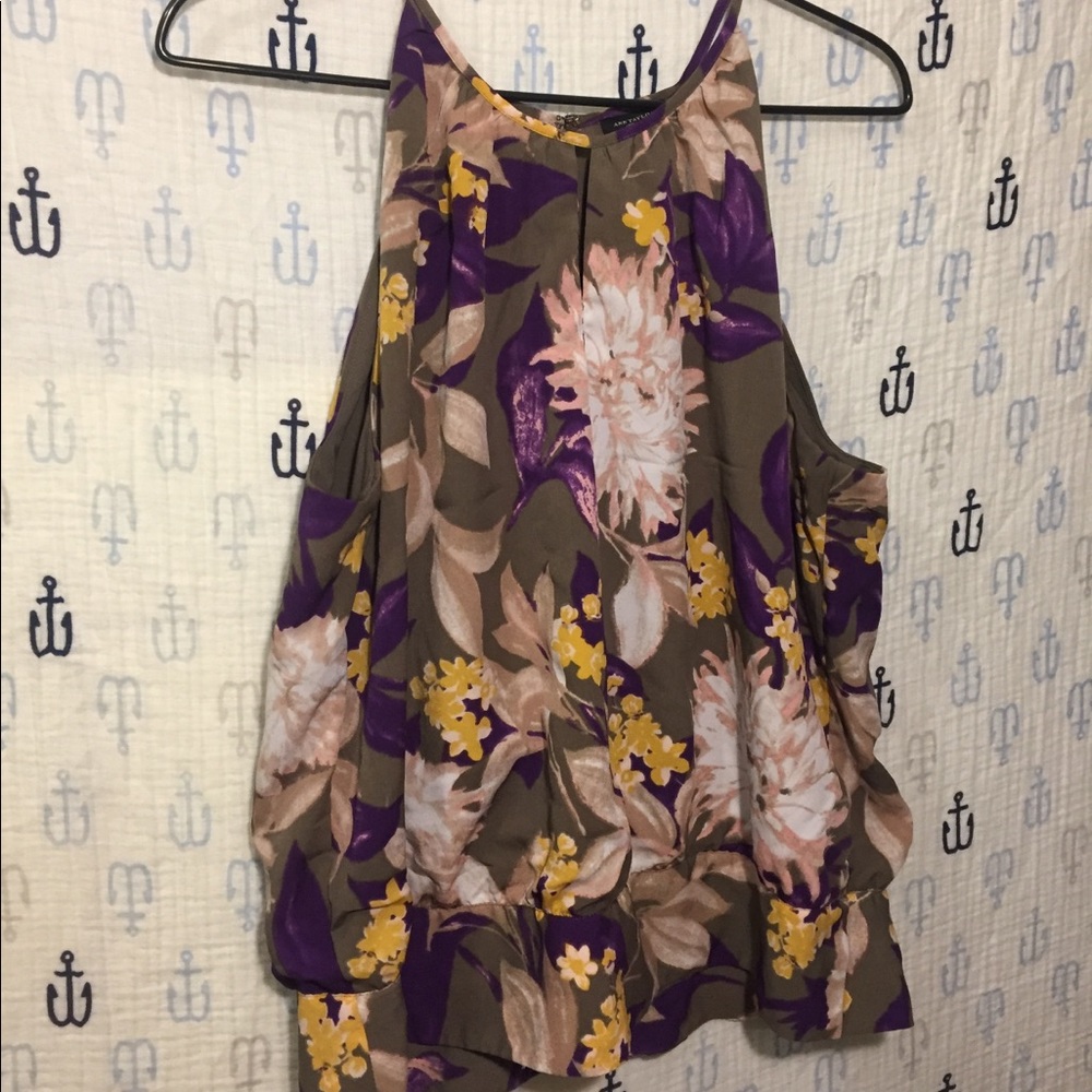 Sleeveless top very spacious and thin